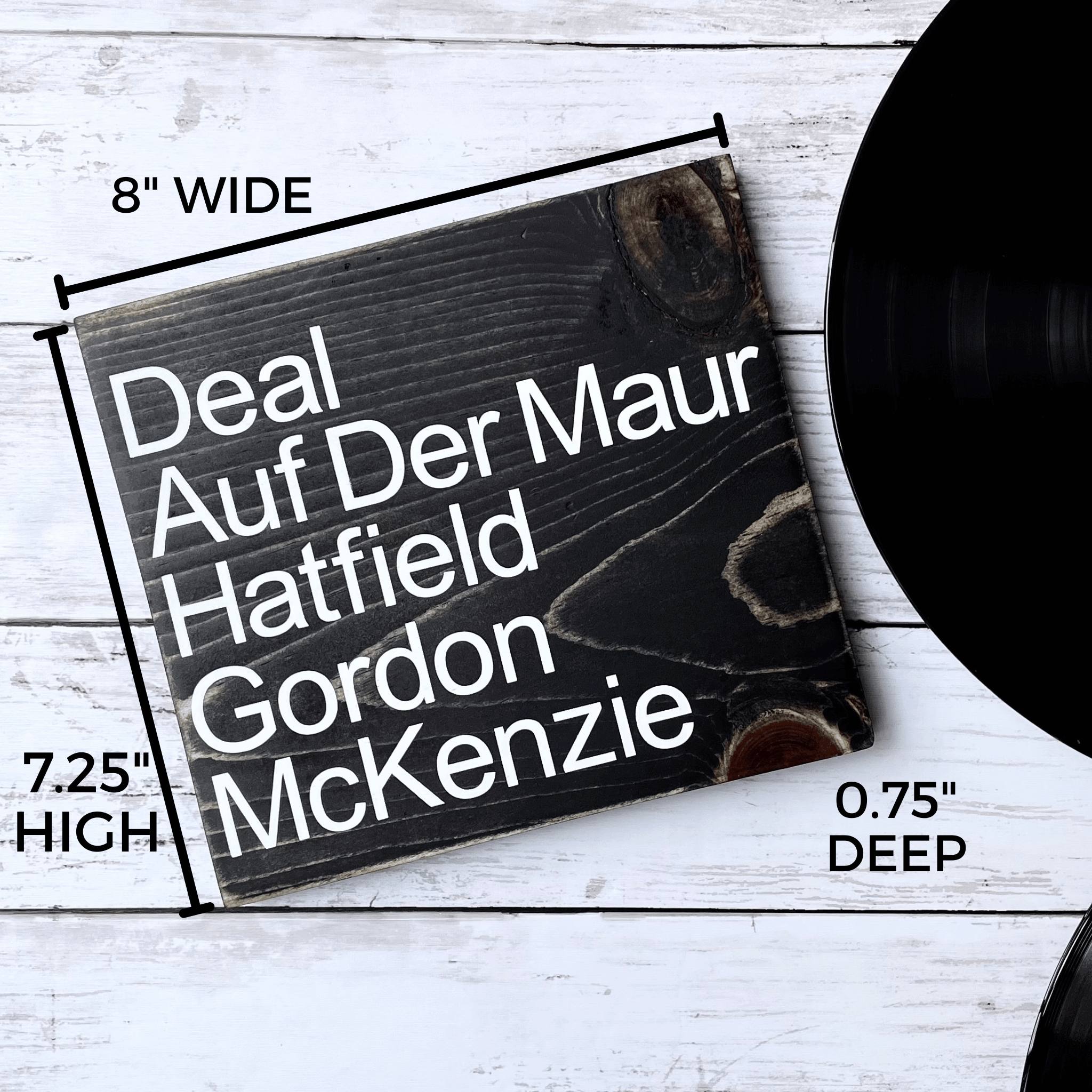 Shows the dimensions of the sign which are 8" wide, 7.25" high and 0.75" deep.