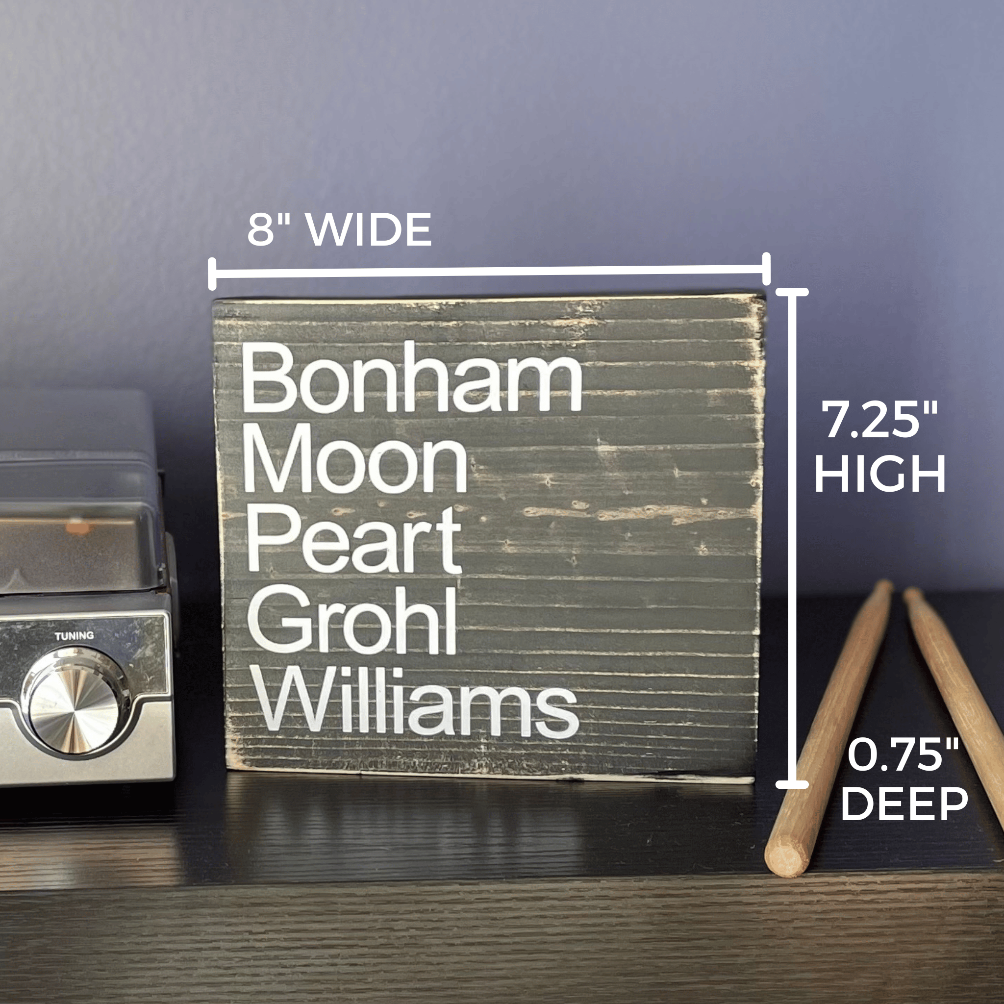 Shows the dimensions of the sign which are 8" wide, 7.25" high and 0.75" deep.
