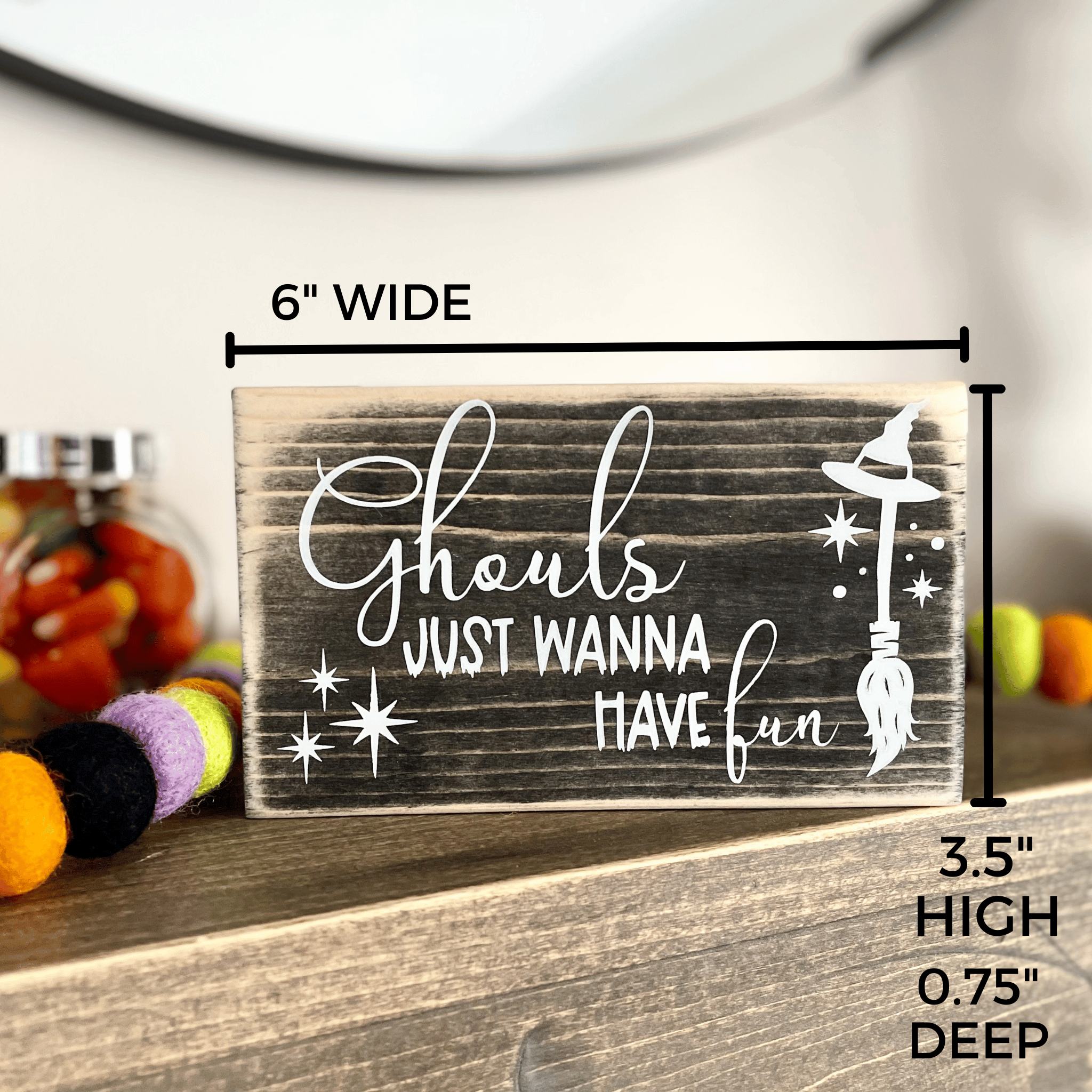 Shows the dimensions of the sign that reads "Ghouls just wanna have fun" which are 6" wide, 3.5" high and 0.75" deep.