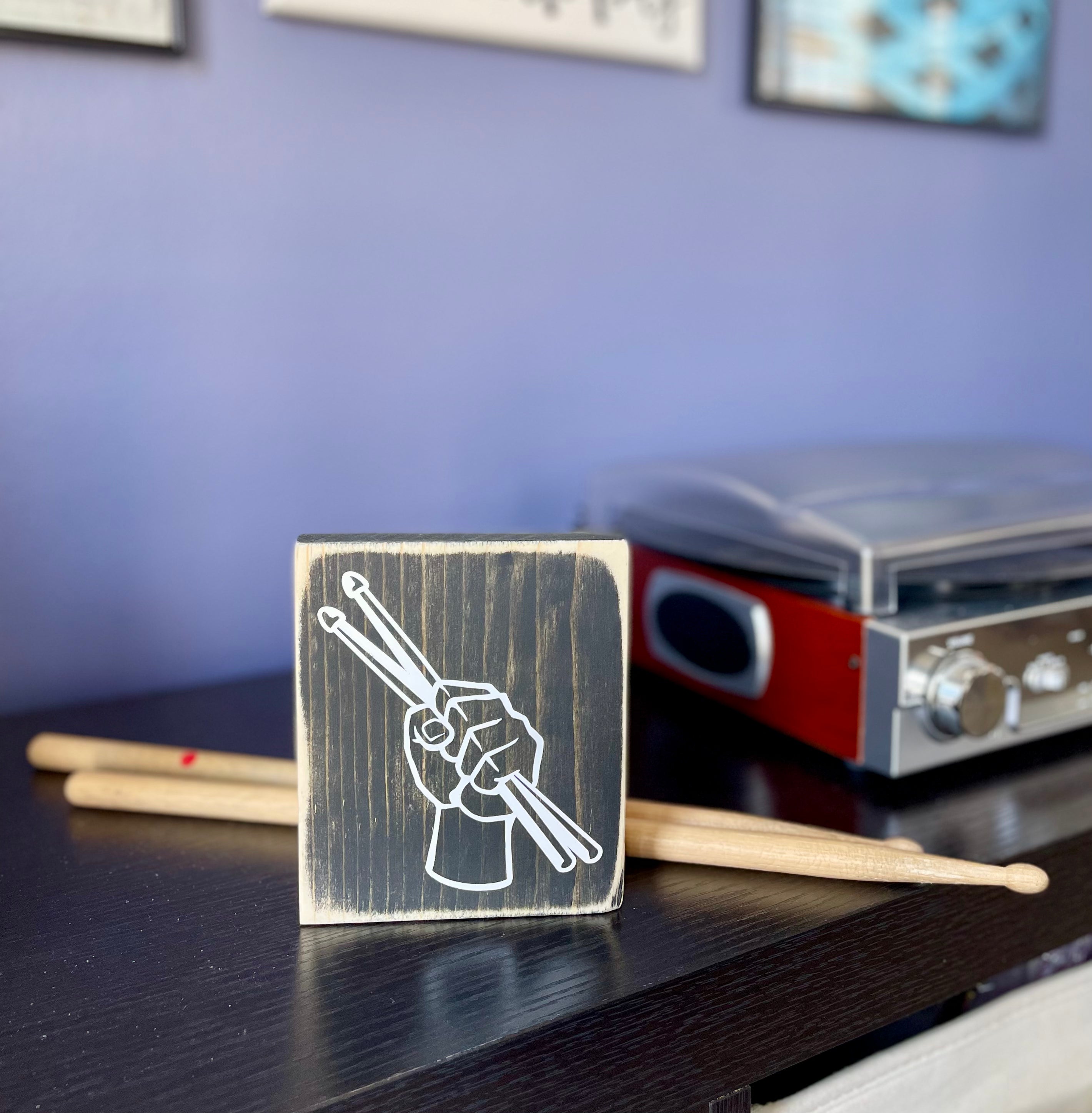 Drumsticks in Fist Sign