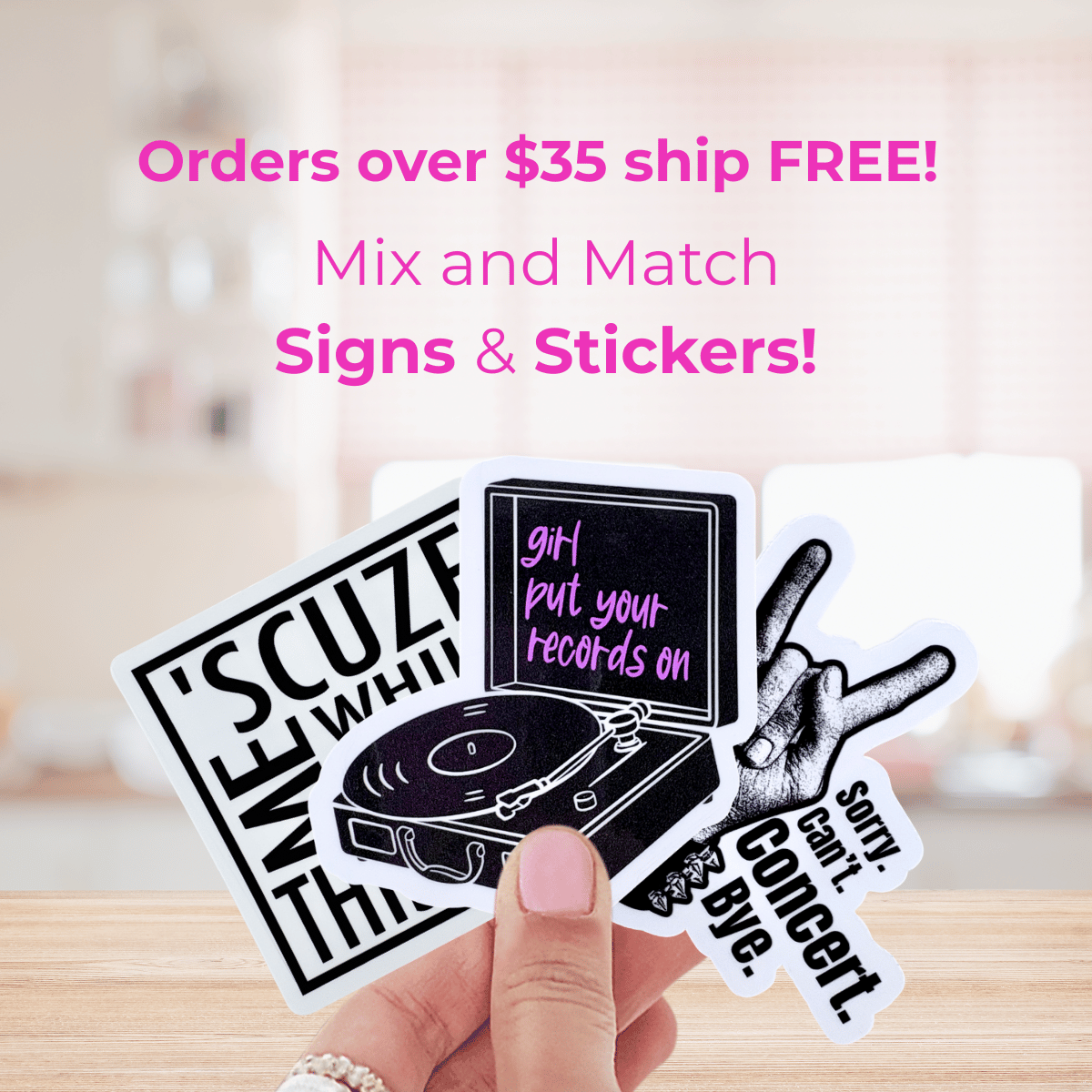Hand holding vinyl record-themed stickers with promotional text about free shipping and mix-and-match options.