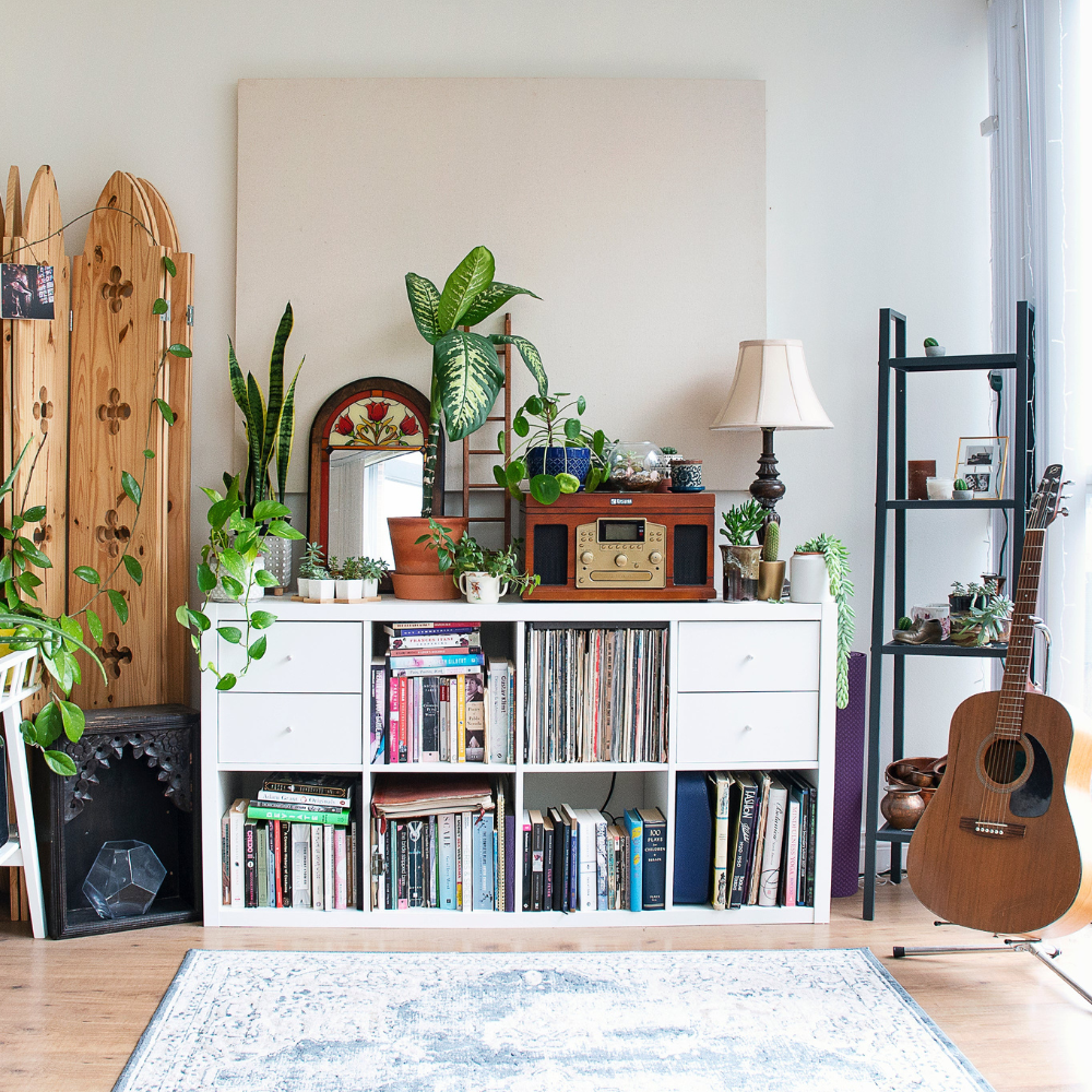 A Listening room with vinyl records and a guitar